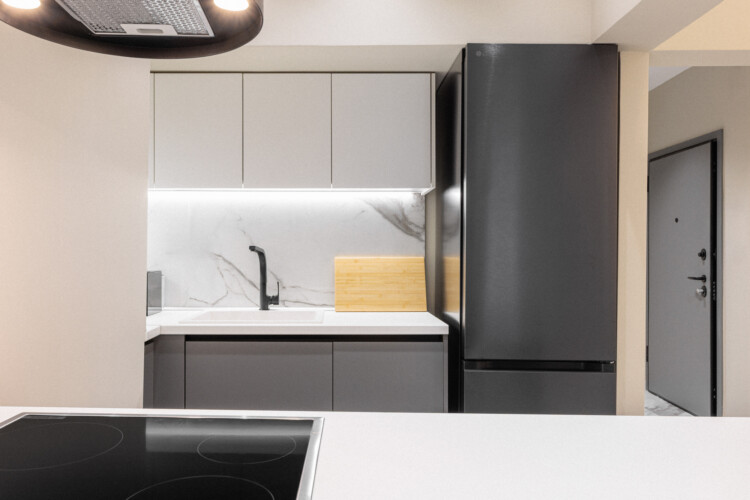 Dry Martini two-bedroom apartment in the city center with premium amenities, two bathrooms, stylish living room, and private balcony for a comfortable stay in Thessaloniki.