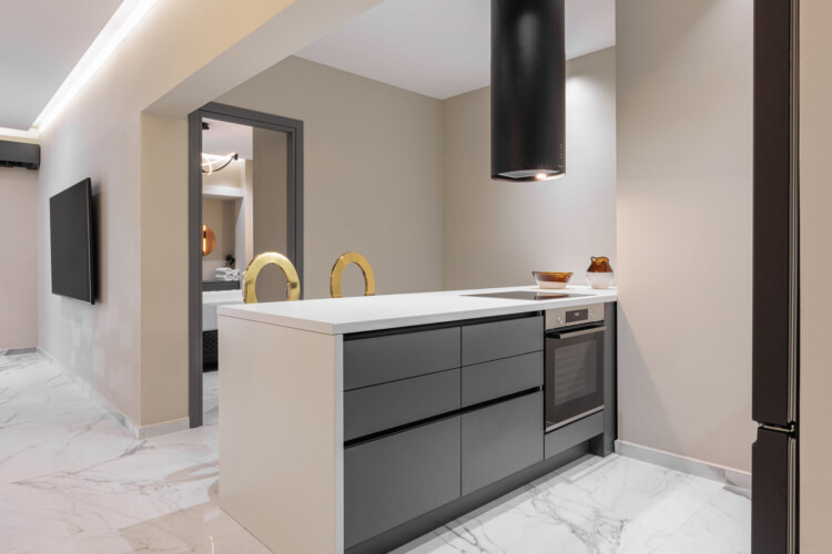 Dry Martini two-bedroom apartment in the city center with premium amenities, two bathrooms, stylish living room, and private balcony for a comfortable stay in Thessaloniki.