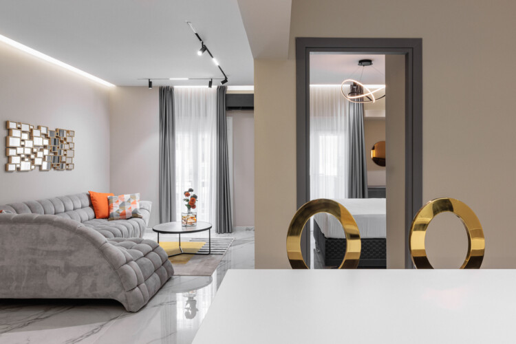 Dry Martini two-bedroom apartment in the city center with premium amenities, two bathrooms, stylish living room, and private balcony for a comfortable stay in Thessaloniki.