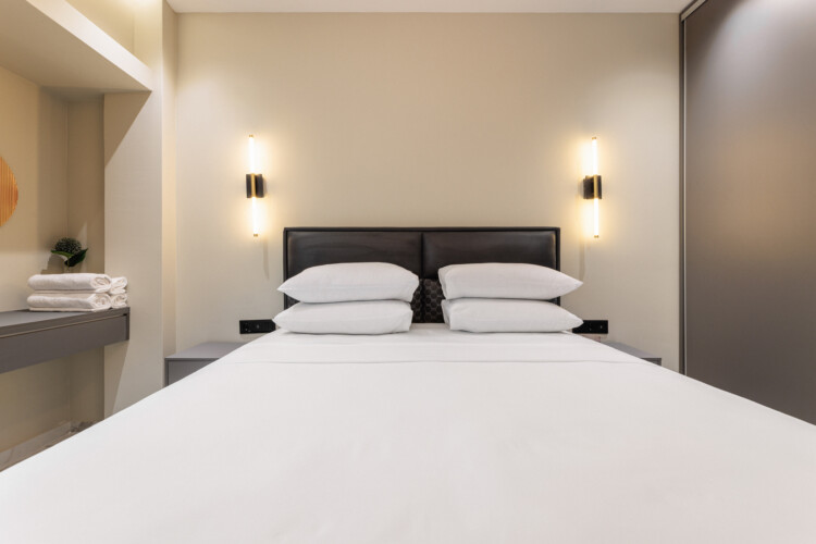 Dry Martini two-bedroom apartment in the city center with premium amenities, two bathrooms, stylish living room, and private balcony for a comfortable stay in Thessaloniki.