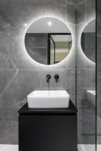 Dry Martini two-bedroom apartment in the city center with premium amenities, two bathrooms, stylish living room, and private balcony for a comfortable stay in Thessaloniki.