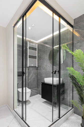 Dry Martini two-bedroom apartment in the city center with premium amenities, two bathrooms, stylish living room, and private balcony for a comfortable stay in Thessaloniki.