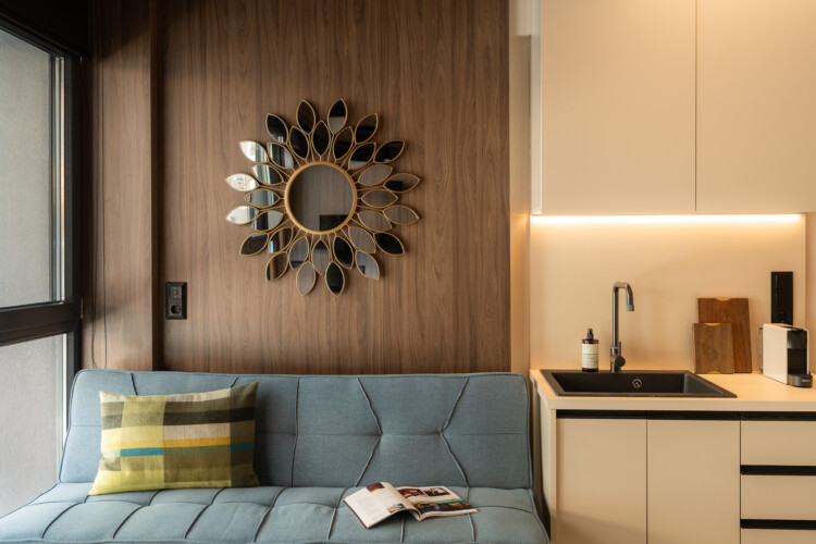 Modern loft bathroom with walk-in rain shower at FOS Apartments in Thessaloniki