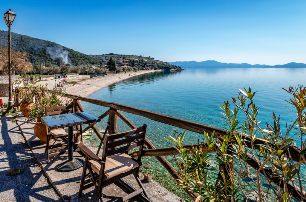 High angle view of Abovos beach in Afissos, a traditional village built amphitheatrically on the slopes of Mount Pelion, with view to the Pagasetic Gulf. In Thessaly, Greece.