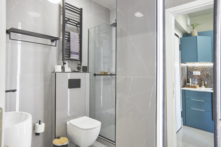 Halu! Modern bathroom at Verde Premium Apartments featuring sleek design with glass shower and elegant fixtures for luxury living Decor enhances comfort and style