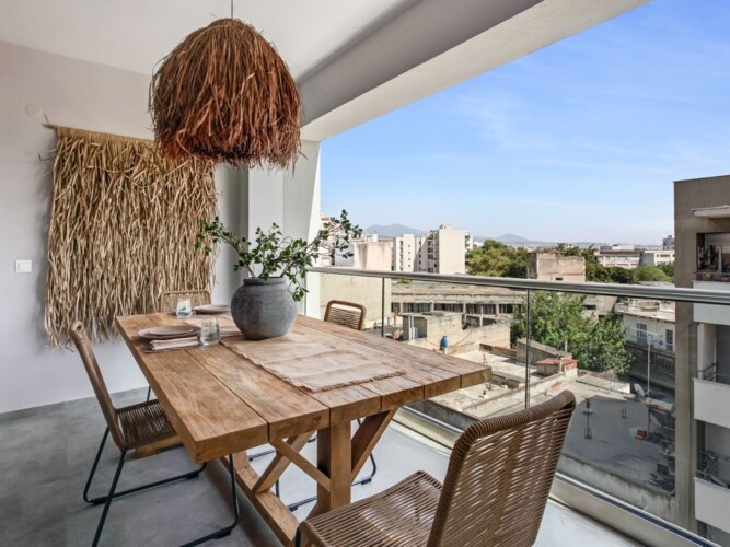 Halu! Experience luxury at Verde premium apartments with a stylish balcony view. Enjoy serene cityscapes in a modern setting, perfect for relaxation and comfort.