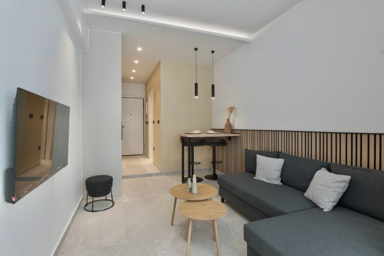Halu! Experience comfort and style at Odyssey - Premium SKG suites in the heart of Ladadika Center with sleek interior design and modern amenities for a perfect stay.