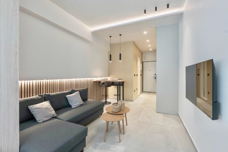 Halu! Experience luxury living at Odyssey - Premium SKG Suites located in the heart of Ladadika Center with modern design and cozy atmosphere perfect for relaxation.