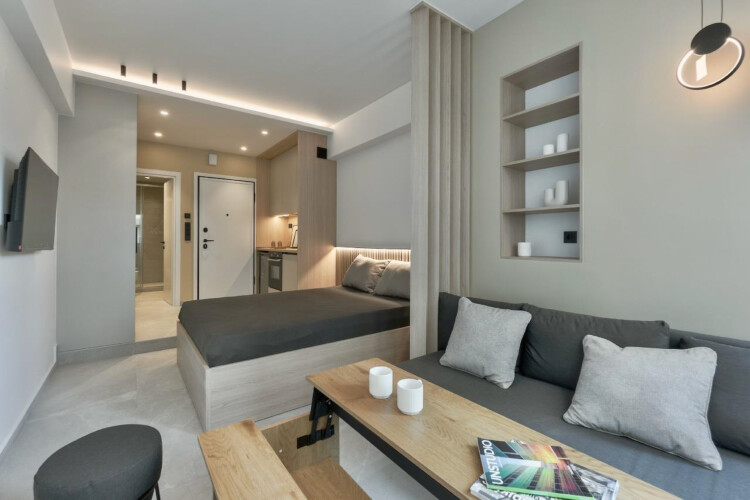 Halu! Discover Odyssey Premium SKG suites in Ladadika Center featuring modern decor and cozy ambiance perfect for a relaxing stay in the heart of the city.